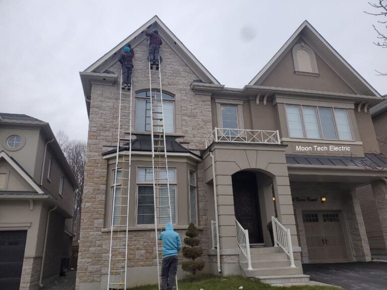 Electrician Installing Potlights Outside Home in Toronto | Moon Tech Electric